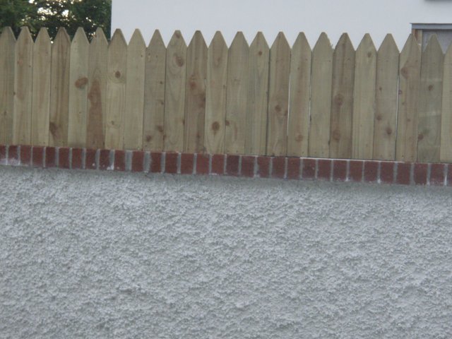 Pointed Top Closed Picket fitted on Timber Battens attached to Wall - Shankill